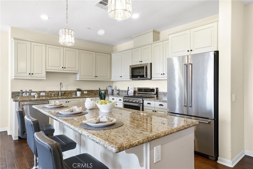 Introducing a stunning top-floor, single-story residence in the - photo 14