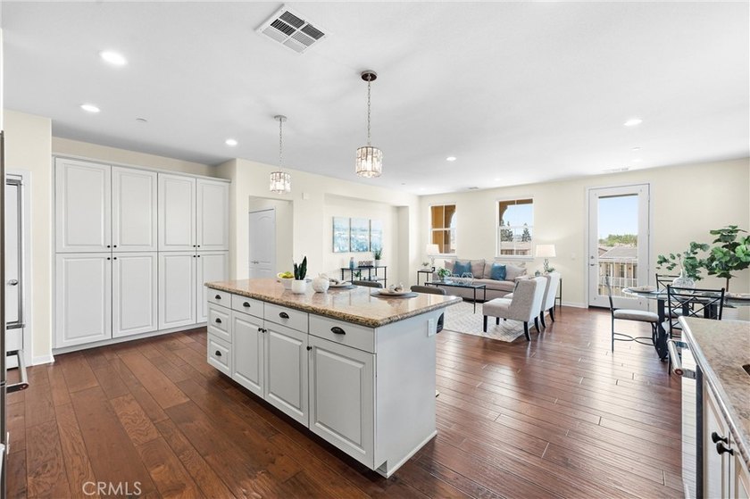 Introducing a stunning top-floor, single-story residence in the - photo 16
