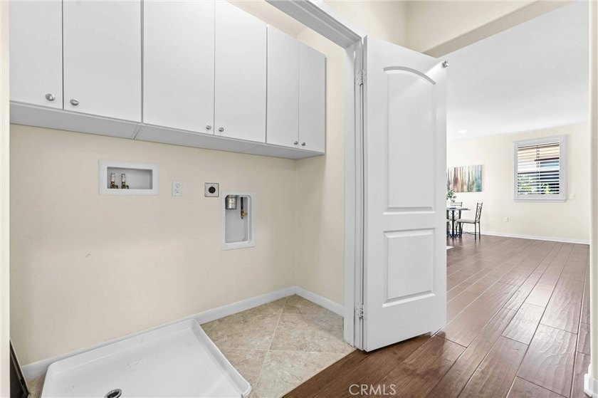 Introducing a stunning top-floor, single-story residence in the - photo 27