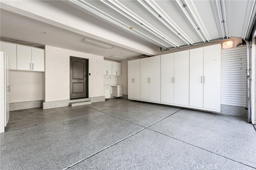Introducing a stunning top-floor, single-story residence in the - photo 28