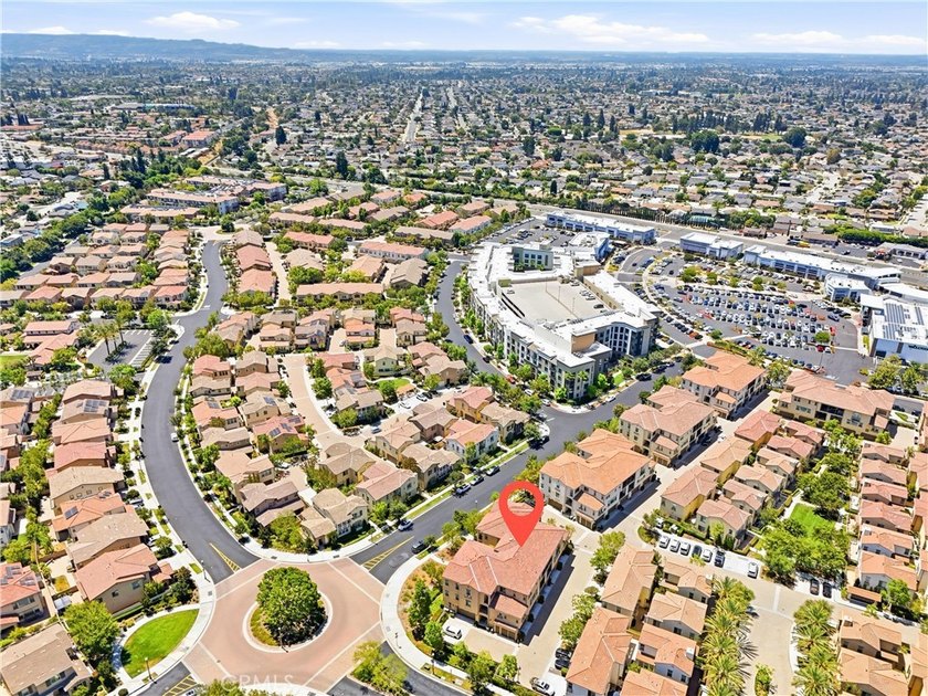 Introducing a stunning top-floor, single-story residence in the - photo 35