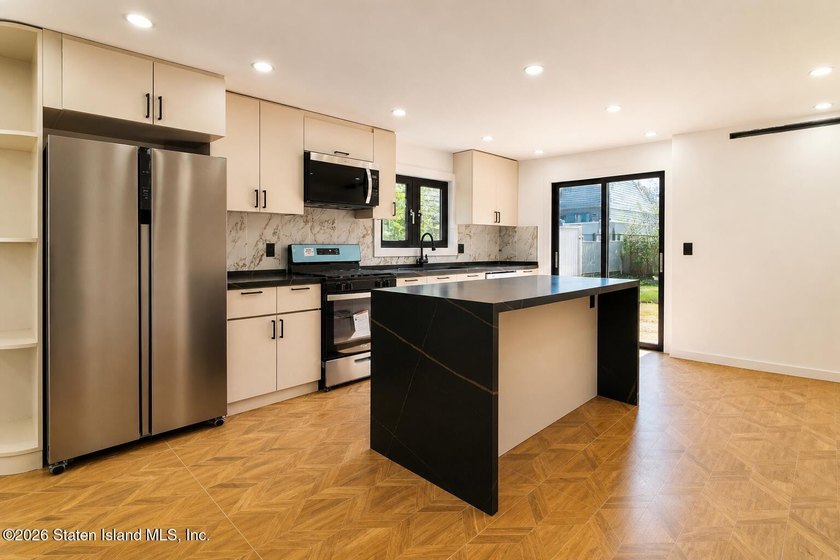 Beautifully renovated single-family Detached home in the - photo 11