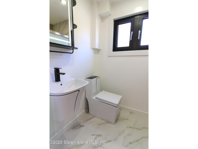 Beautifully renovated single-family Detached home in the - photo 22