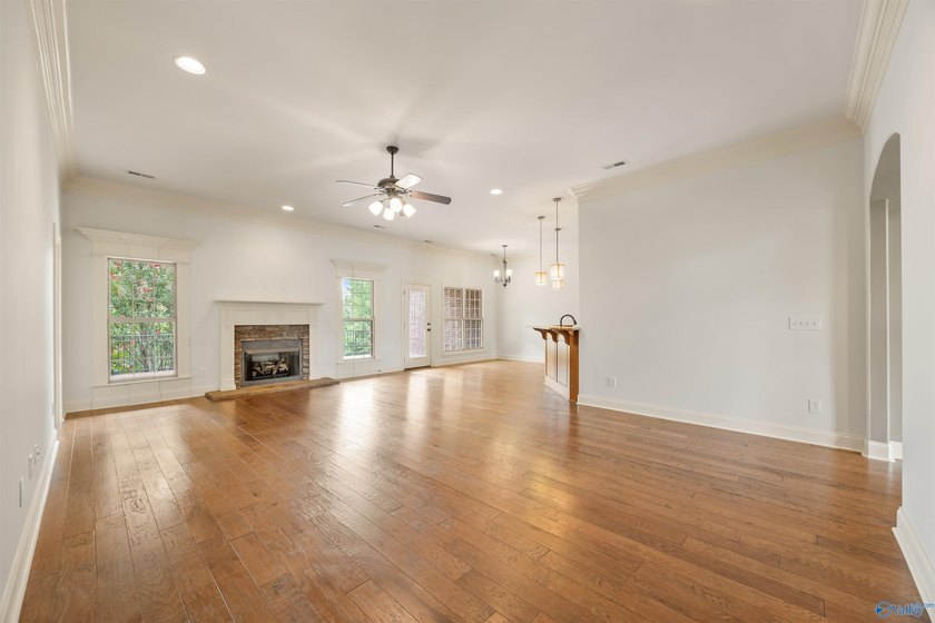 Lake-view ranch featuring 4 bedrooms, 4 full baths, a spacious - photo 8
