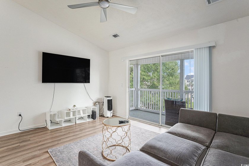 This top-floor remodeled, 1-bedroom, 1-bath condo offers a - photo 4