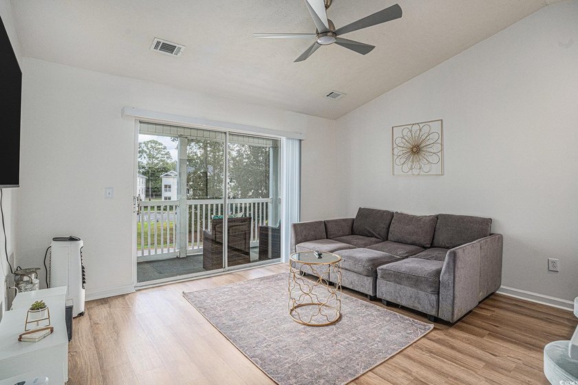 This top-floor remodeled, 1-bedroom, 1-bath condo offers a - photo 5