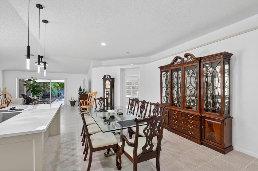 WOW - Awesome pool home with renovated kitchen, flooring and - photo 7