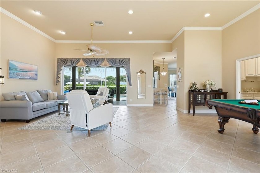 Enjoy coveted southern exposure and quick boating access to the - photo 9