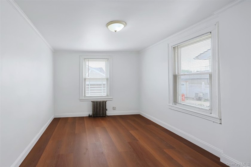 Welcome to this beautifully renovated detached 2-family home in - photo 7
