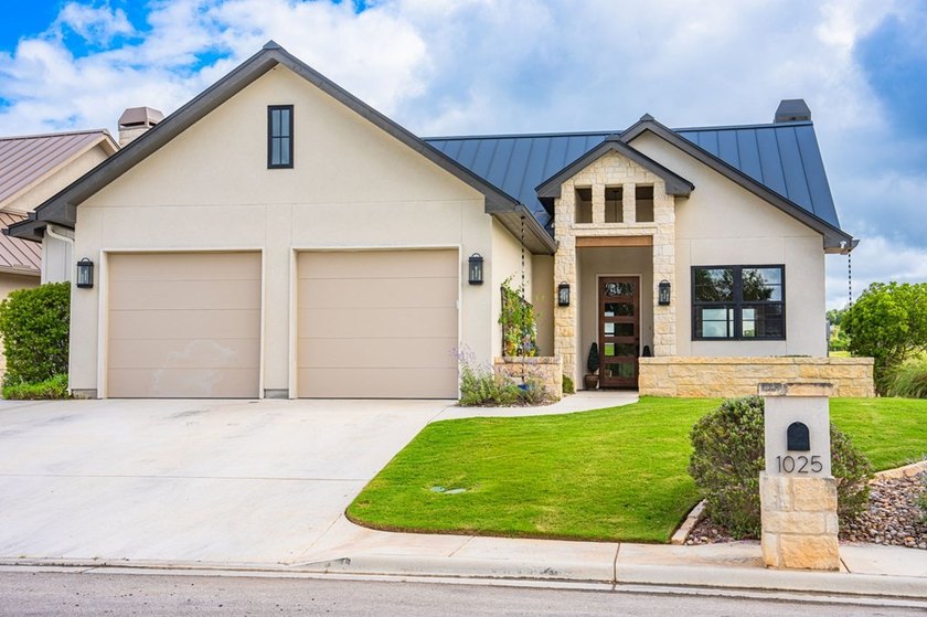 Experience luxury Hill Country living in this stunning rock &amp; - photo 9