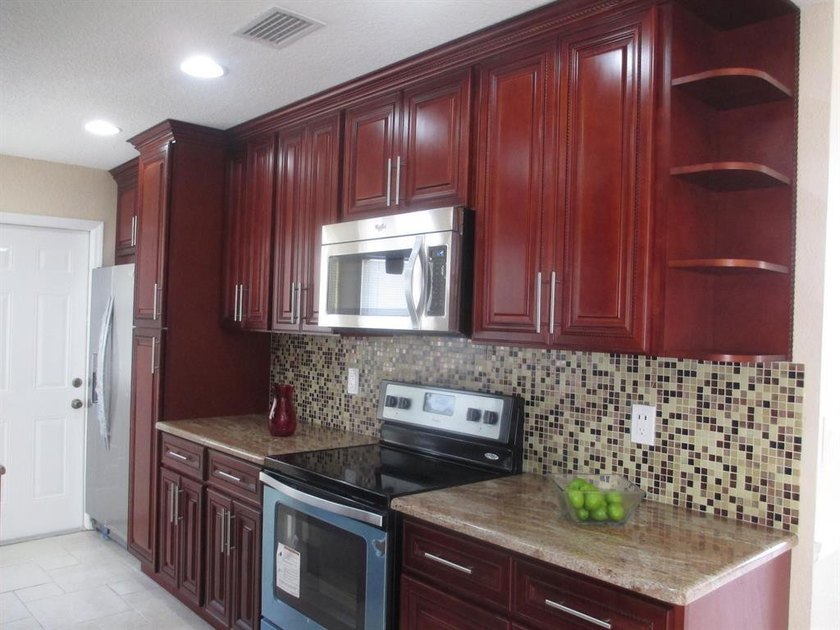 WELCOME HOME! Spacious 3BR, 1-car garage home situated on a - photo 3