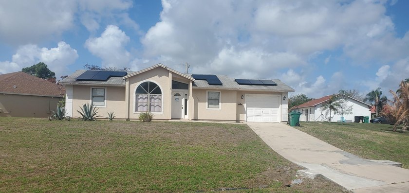 WELCOME HOME! Spacious 3BR, 1-car garage home situated on a - photo 4