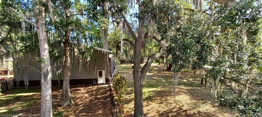 Welcome to your private slice of Old Florida charm. Set across - photo 6