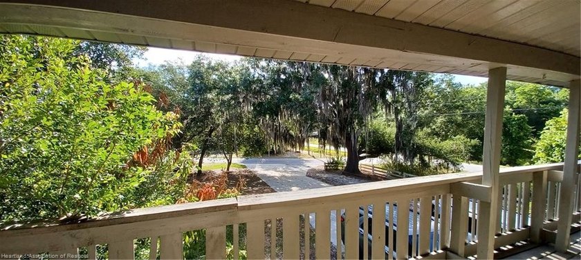 Welcome to your private slice of Old Florida charm. Set across - photo 7