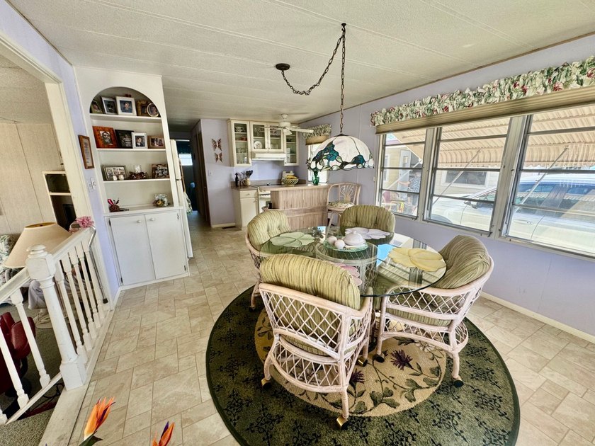 A charming mobile home is now for sale in the unique 55+ - photo 5