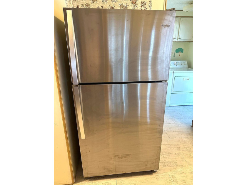 PRICED TO SELL AND FULL OF POTENTIAL!!! THIS 2-BEDROOM - photo 11