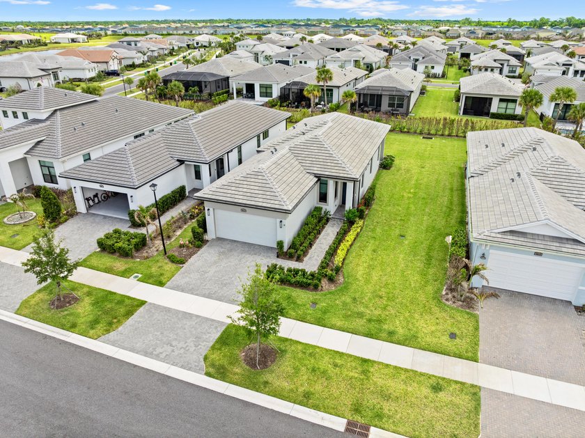 Welcome to luxury living in PGA Verano! This 2024 Alison model - photo 7