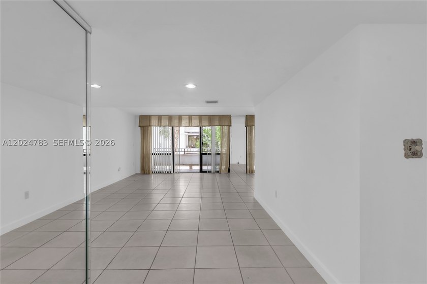 Live in the largest corner unit in a prestigious community of - photo 4