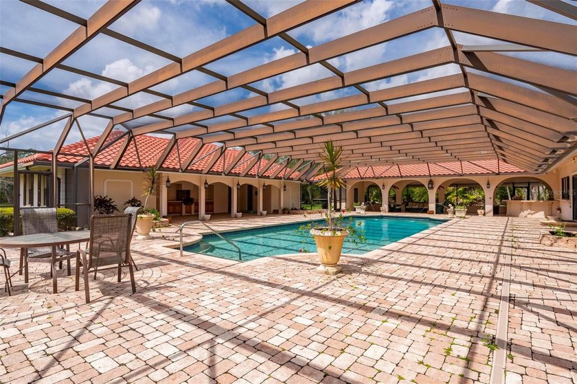 Set on a rare and expansive 5.4-acre parcel in the heart of town - photo 3