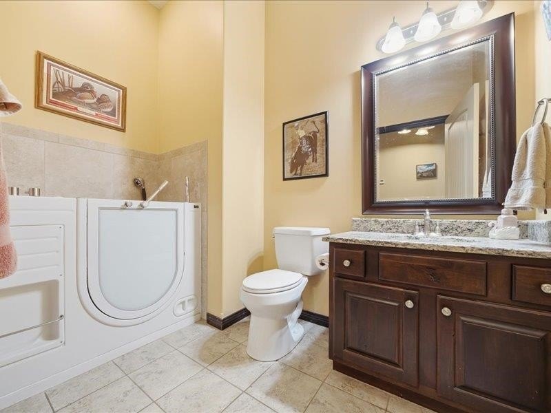 One level custom-built home with zero entry in Augusta's Stone - photo 26