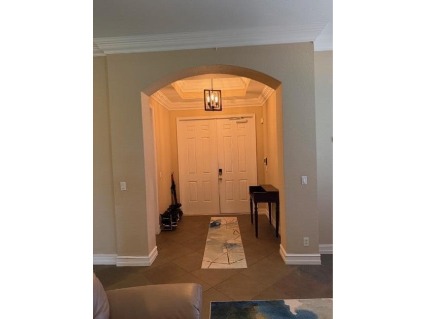 Discover this elegant former model home in the sought-after - photo 6