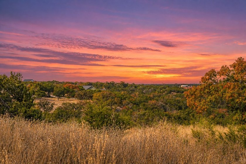 Discover this exceptional 1.24-acre corner lot in the coveted - photo 2