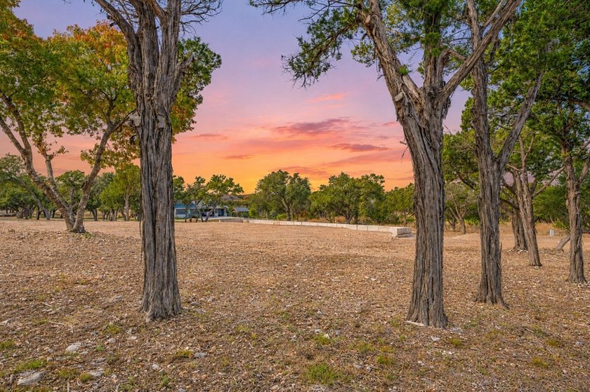 Discover this exceptional 1.24-acre corner lot in the coveted - photo 9