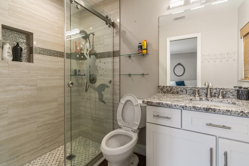 This 3BR/2BA home offers comfort, convenience, and income - photo 9
