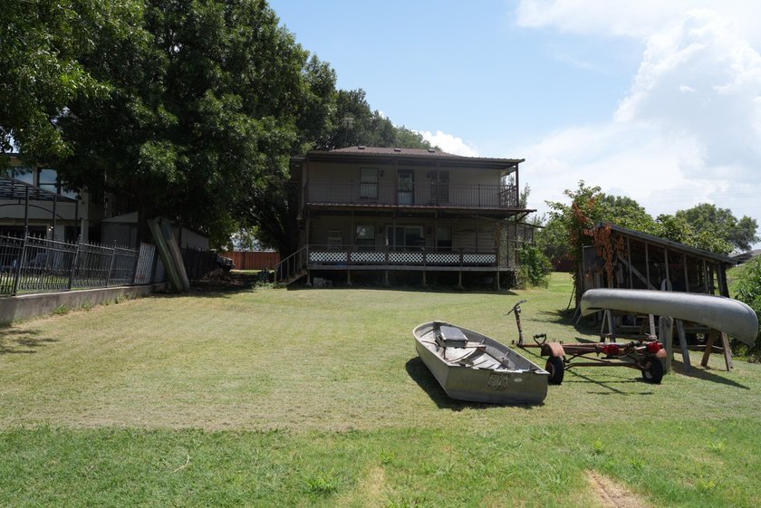 Rare opportunity to own a prime lakefront property with - photo 11