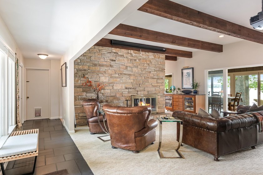 This 4-bedroom, 3-bath midcentury lake home offers 100 feet of - photo 8