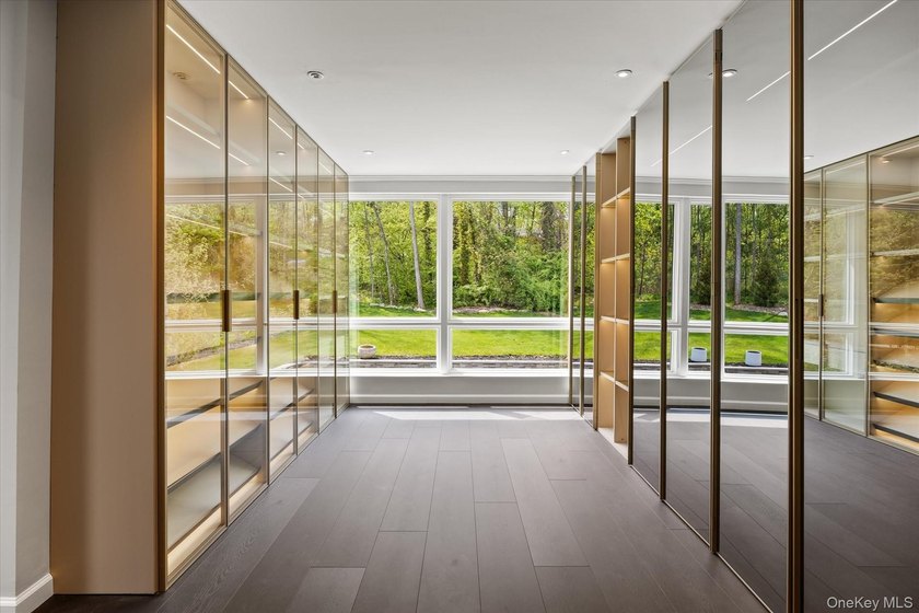 Privately set behind a long driveway in the prestigious Village - photo 23