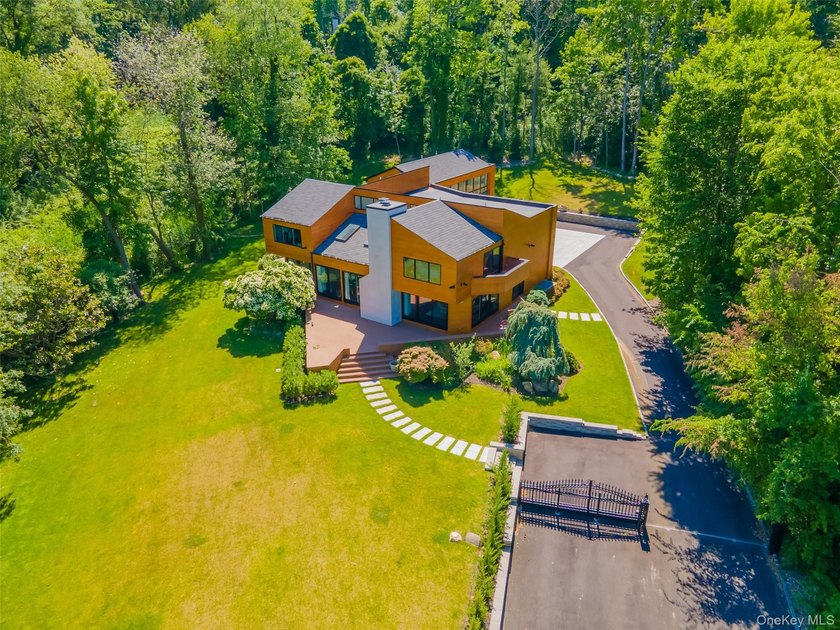 Privately set behind a long driveway in the prestigious Village - photo 42