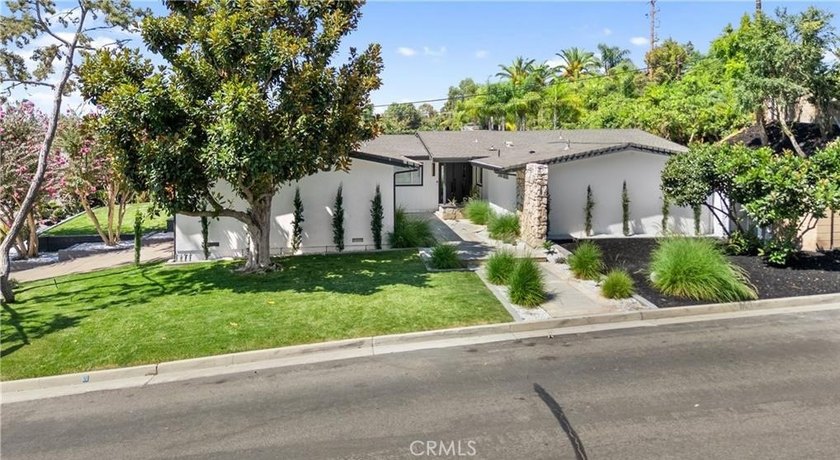 Beautifully updated single-level home on a private corner lot in - photo 3