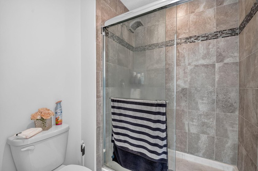 Newer construction, builder-upgraded townhome maintained in - photo 17