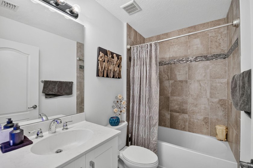 Newer construction, builder-upgraded townhome maintained in - photo 19
