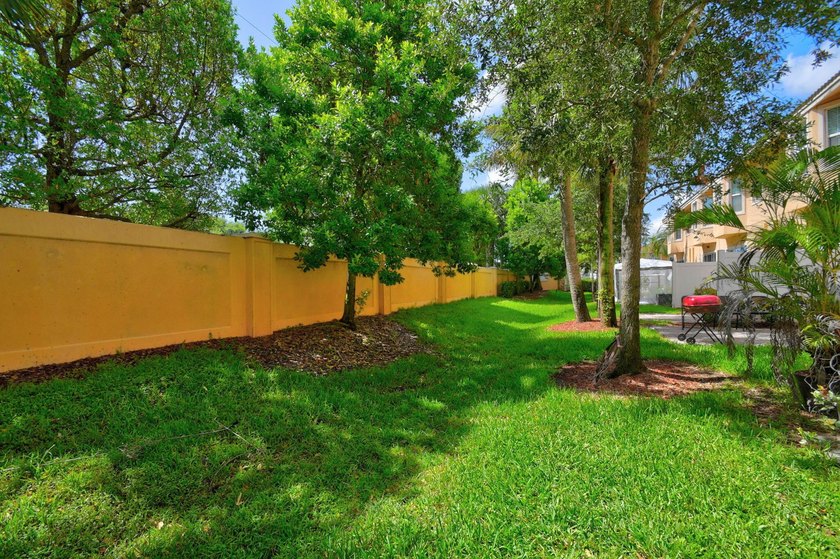 Newer construction, builder-upgraded townhome maintained in - photo 26