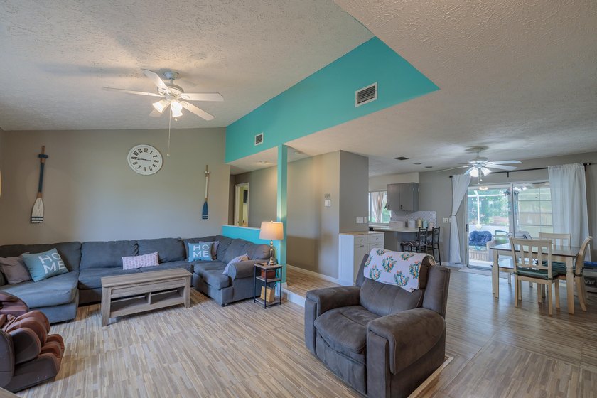 Welcome to this charming 2-bedroom, 2-bath pool home in the - photo 4