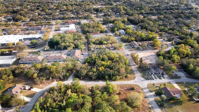 GREAT INVESTMENT PROPERTY! This large corner lot is zoned for 10 - photo 8