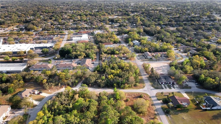GREAT INVESTMENT PROPERTY! This large corner lot is zoned for 10 - photo 9