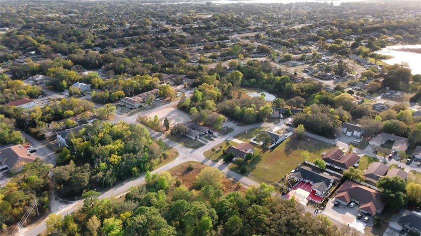 GREAT INVESTMENT PROPERTY! This large corner lot is zoned for 10 - photo 10