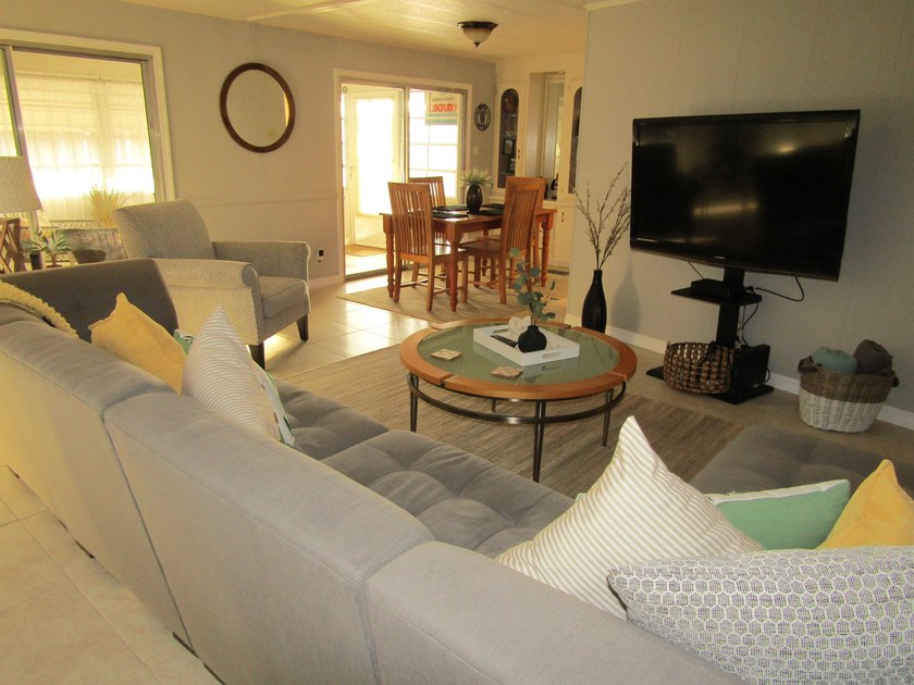 Listed by the Official Sales Team of Jamaica Bay Village. This - photo 3