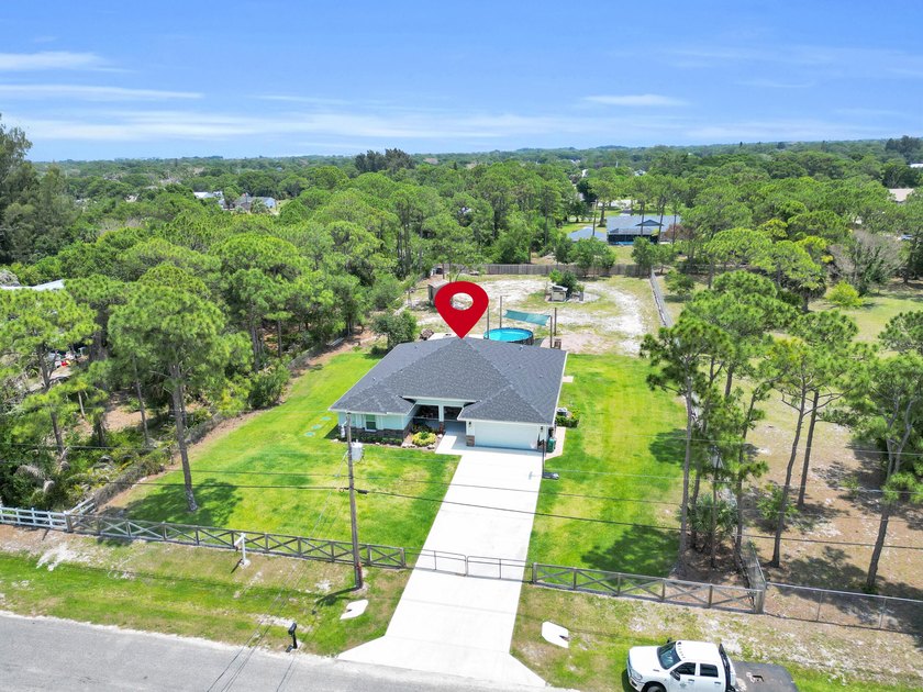 Welcome to this one-of-a-kind custom estate located in the - photo 3