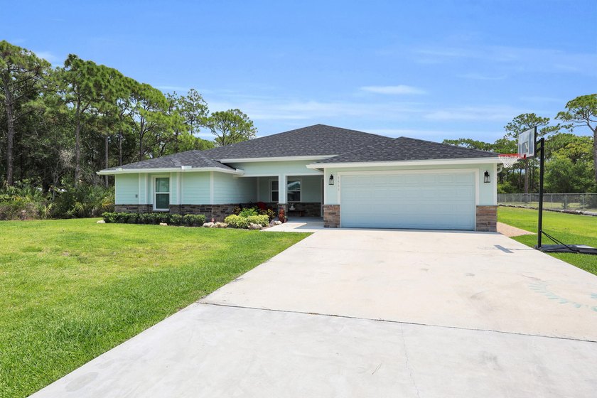 Welcome to this one-of-a-kind custom estate located in the - photo 6