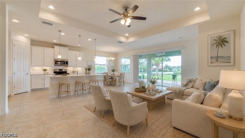 !!Just Reduced!! Located on a premium corner lake lot in the - photo 4
