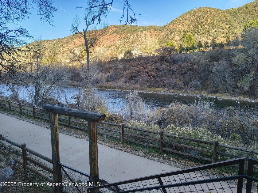 This fully remodeled 2-bedroom, 1.5-bath condo offers riverside - photo 11