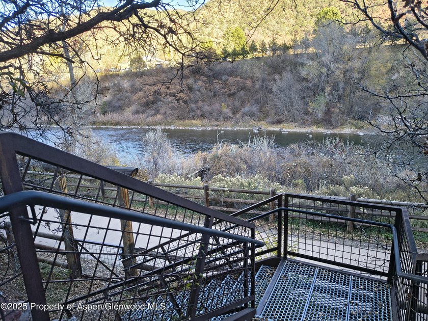 This fully remodeled 2-bedroom, 1.5-bath condo offers riverside - photo 14