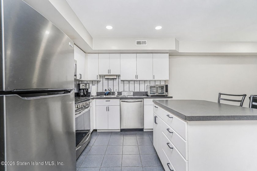 Welcome to 33 Linda Lane, a beautifully maintained multi-level - photo 14