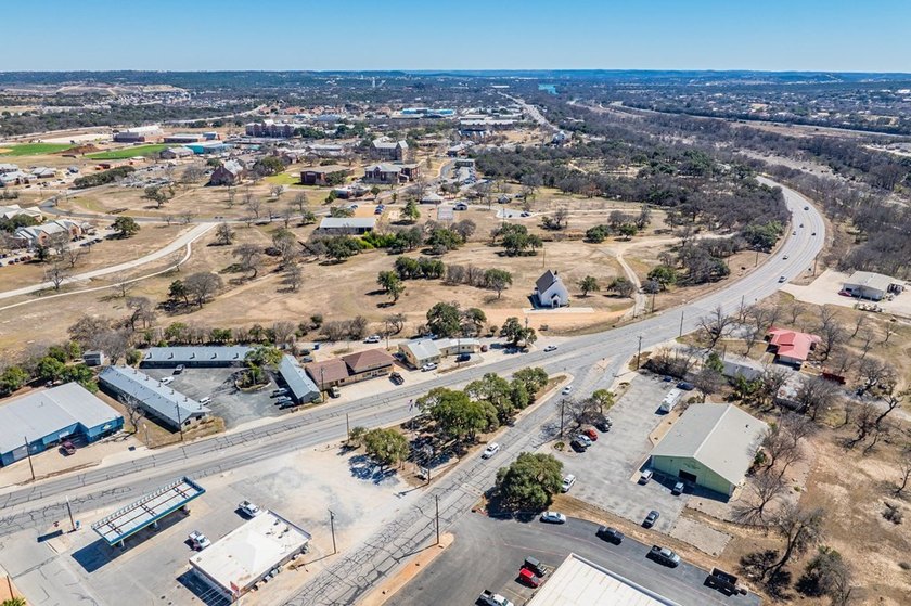 An exceptional opportunity to own a high-visibility - photo 8