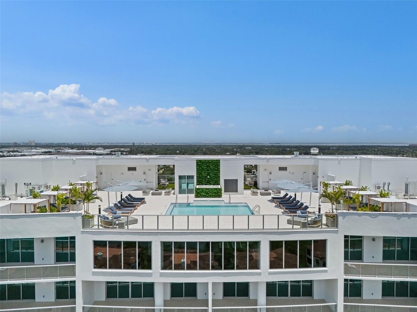 Never-occupied corner condominium at AQUA at Westshore Yacht - photo 2