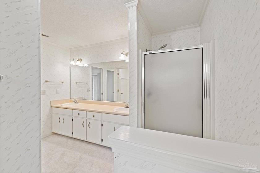Now available in the sought-after Bay Oaks Villas, this - photo 22